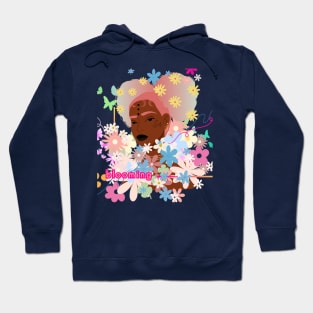 Blooming Floral Beauty: Whimsical Girl Surrounded by Flowers Hoodie